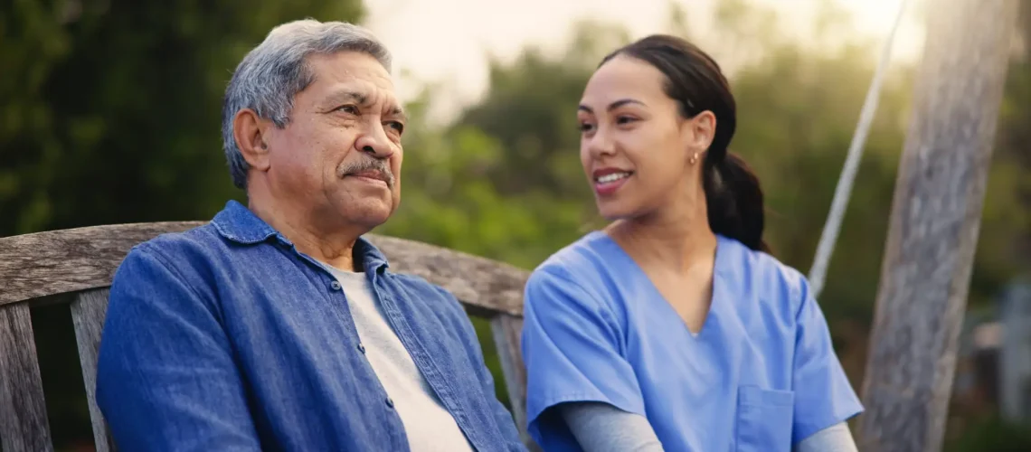 Retirement, old man and nurse on a bench in the park together for nostalgia or thinking of a memory.